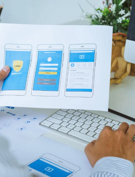 a small globe wearing a graduation hat on an open book